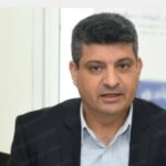 عبد الحافظ أدمينو، عضو المحكمة الدستورية الجديد، في مكتب.