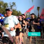 مجموعة من العدائين يستعدون لبدء السباق الدولي ببوسكورة