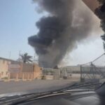 شارع تصطف على جانبيه الأشجار في مدينة إيرانية