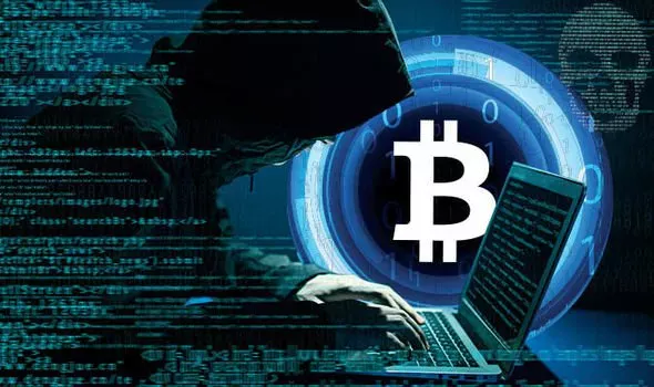 شاب يرتدي قلنسوة يستخدم حاسوباً، خلفية تقنية عملات مشفرة وبيتكوين.