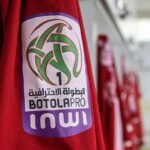 شعار البطولة الاحترافية "إنوي" باللونين الأحمر والأسود.
