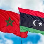 علمي المغرب وليبيا يرفرفانProudly Moroccan and Libyan flags fly side by side.