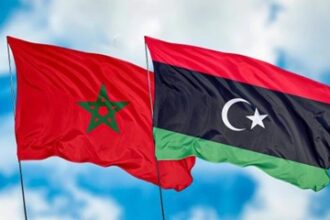 علمي المغرب وليبيا يرفرفانProudly Moroccan and Libyan flags fly side by side.