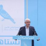 راشيد الطالبي العلمي يلقي كلمة في مهرجان حزبي.