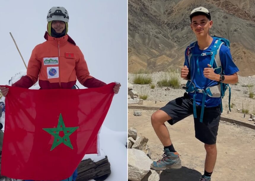 شابان يقفان على قمة جبل، أحدهما يرفع علم المغرب.